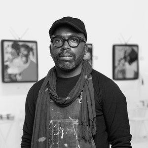 A portrait photograph of Derrick Adams