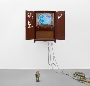 Nam June Paik, Untitled [Console RCA Victor Deluxe], 1996. Single-channel video (color, silent) in a vintage television cabinet with acrylic and toy robot, dimensions variable © Nam June Paik Estate