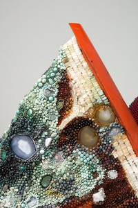 Kathleen Ryan, Screwdriver, 2023 (detail). Onyx, citrine, rhodonite, garnet, agate, tektite, lava rock, turquoise, aquamarine, serpentine, magnesite, amazonite, black tourmaline, jasper, prehnite, ruby in zoisite, marble, amber, labradorite, smoky quartz, quartz, acrylic, and steel pins on coated polystyrene, with aluminum umbrella and 1968 AMC Javelin trunk, 77 × 107 × 88 inches (195.6 × 271.8 × 223.5 cm) © Kathleen Ryan. Photo: Paul Salveson