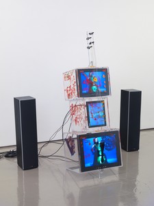 Nam June Paik, TV Cello, 2003. Single-channel video with 20-inch LCD monitor, 15-inch LCD monitor, and 13-inch CRT monitor, 64 ½ × 21 ½ × 23 inches (163.8 × 54.6 × 58.4 cm) © Nam June Paik Estate. Photo: Rob McKeever